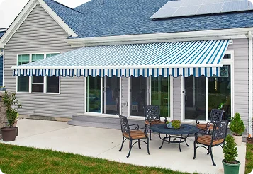 Exterior view of home with awnings